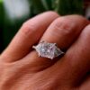 2.05* carat princess cut natural diamond set in platinum three diamond ring