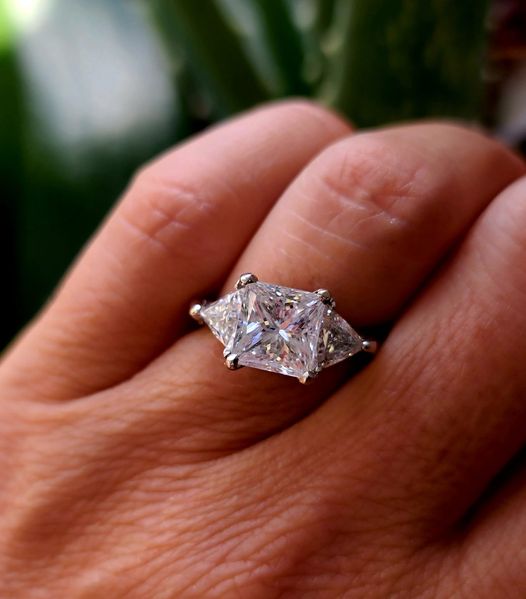 2.05 carat princess cut natural diamond set in platinum three diamond ring Elliott s Jewelers