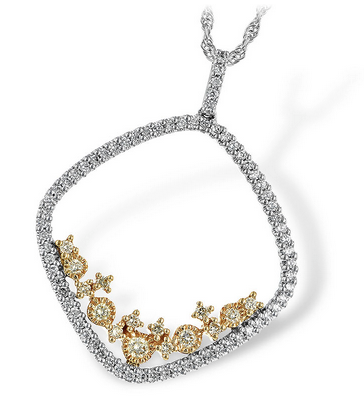 Naturally, Yellow and white diamonds Halo pendant. 14 kt