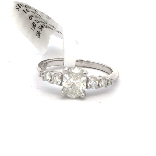 1.30 ct tw weight Oval center 7 diamond 14 kt white gold engagement ring.