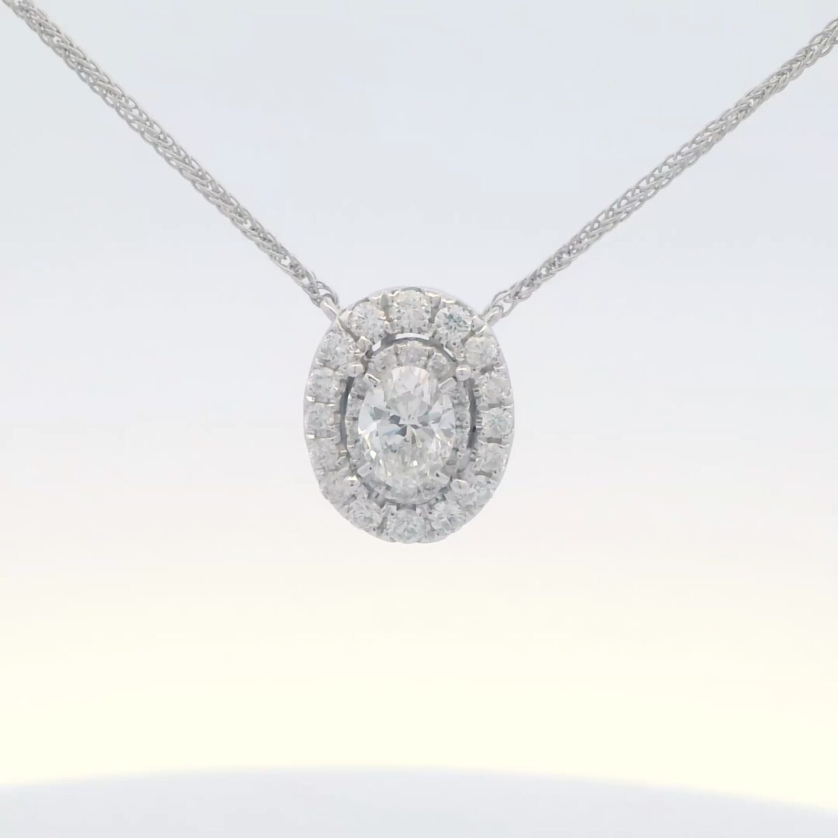 Ladies 14k White Gold Oval Diamond Halo Pendant