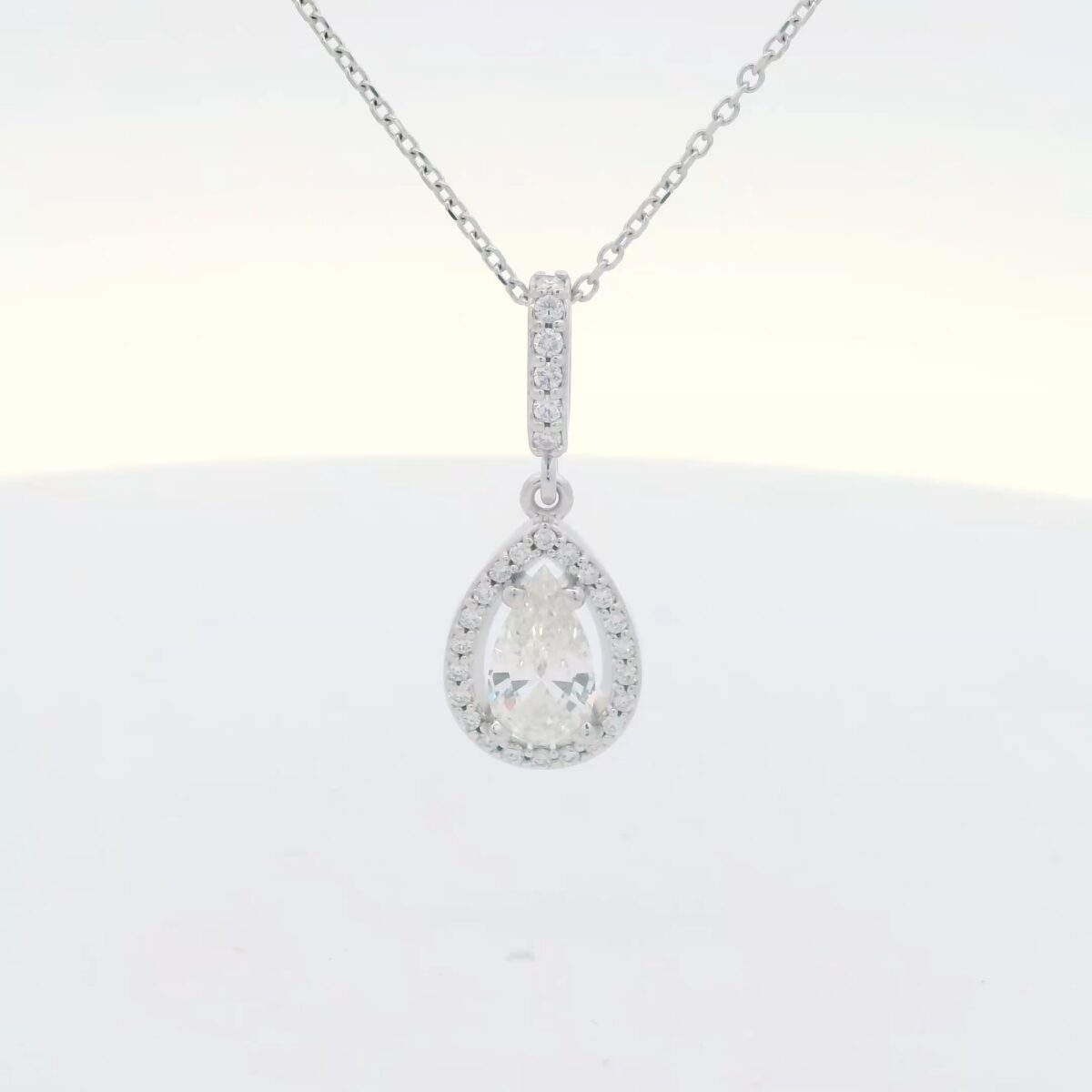 14K WG Pear Shaped Diamond w/ Halo Pendant (.90 cttw.)