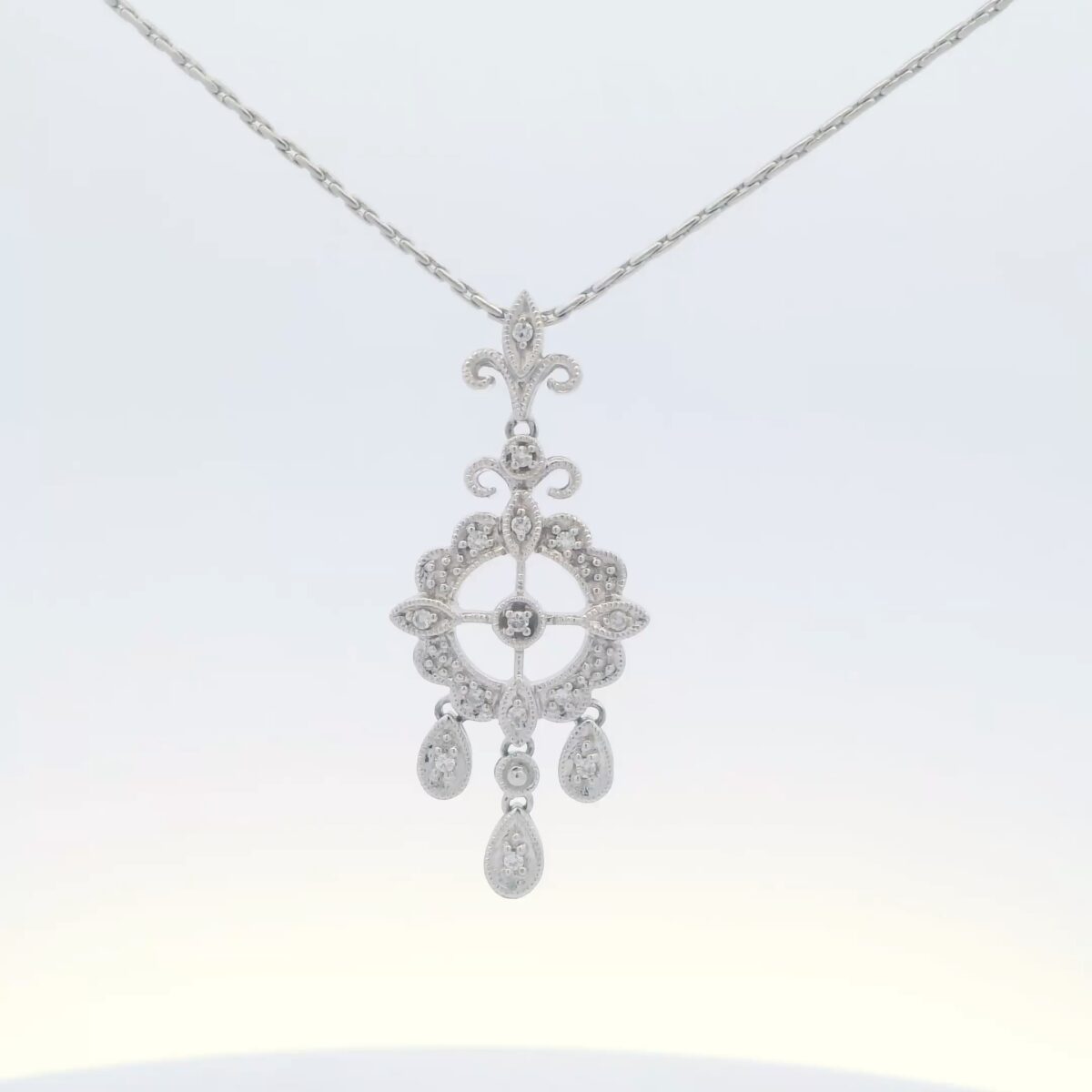 14K White Gold Dangle Necklace w/ .08 tw. Diamonds