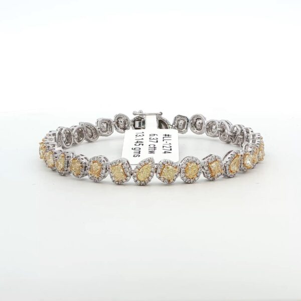 14K WG Diamond Tennis Bracelet w/ Mixed Shape Fancy Yellow Diamonds surrounded by Round Brilliant White Diamonds (6.37 cttw.)