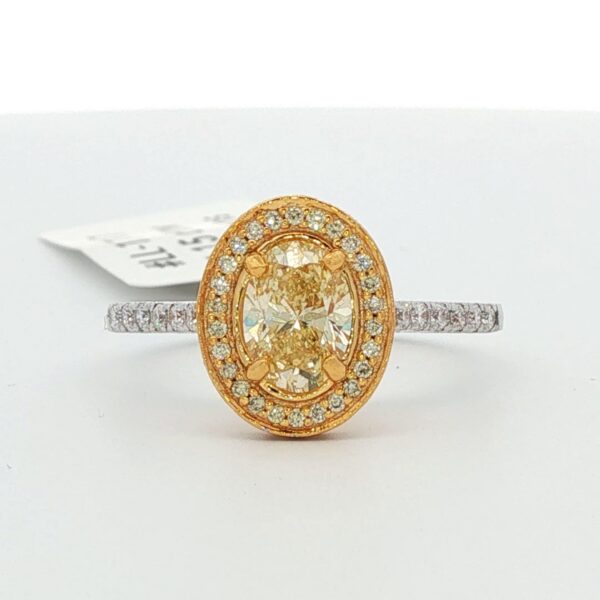 14K 2-Tone Gold Ring w/ Natural Fancy Yellow Oval Center Diamond & Halo (1.15 cttw.)