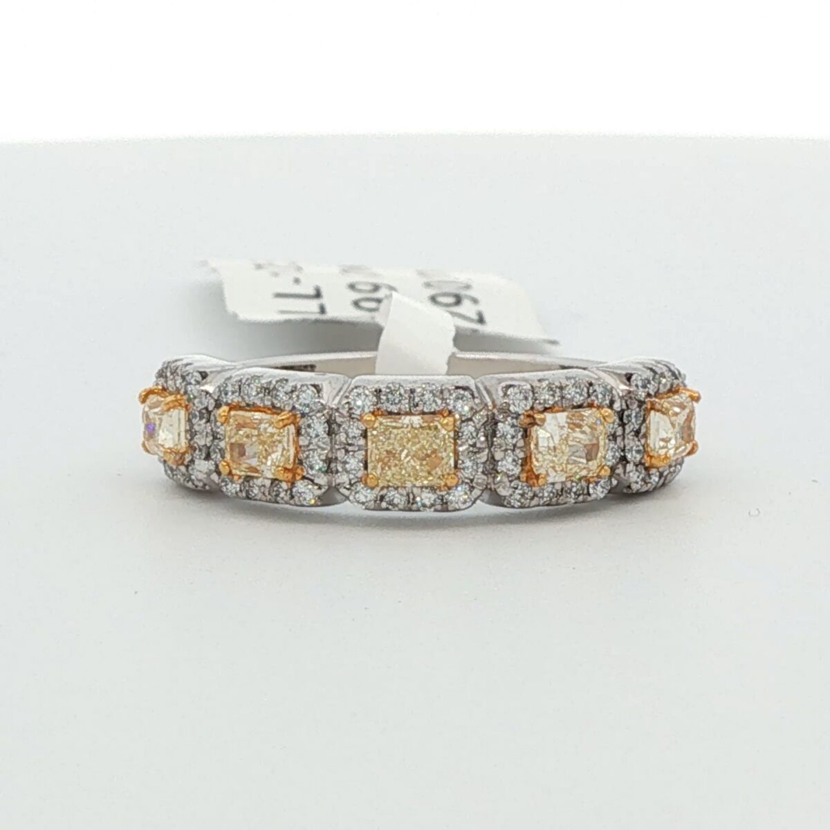 14K WG Ring w/ 5 radiant cut fancy yellow diamonds surround by white diamond halos