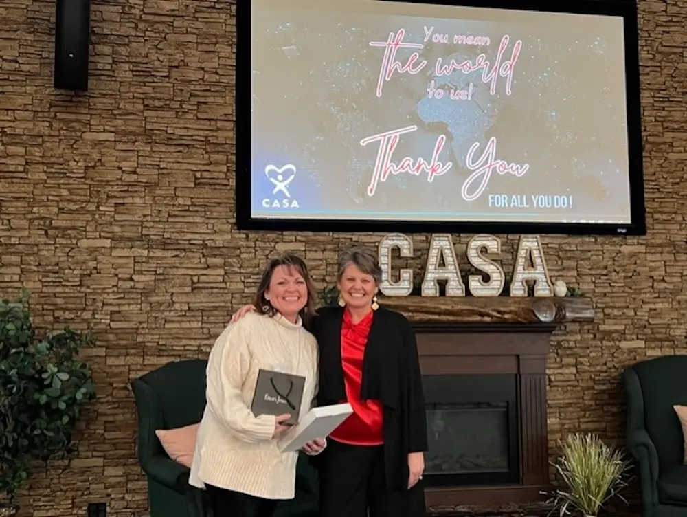 two women pictured at the 2025 CASA event