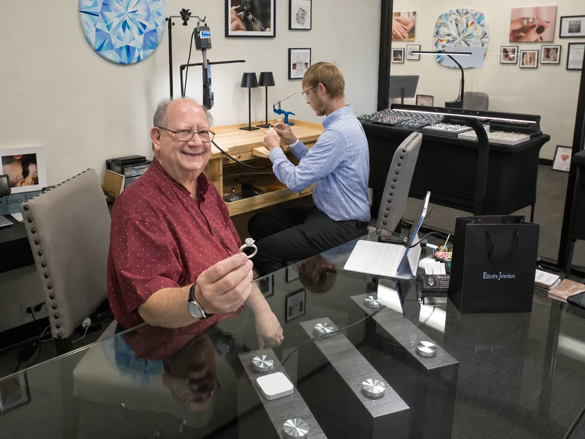 Elliott holding a ring in his hunstville studio