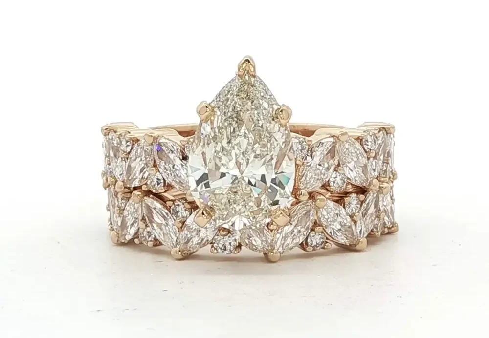 custom pear-cut diamond multistone ring in rose gold from Elliott's Jewelers