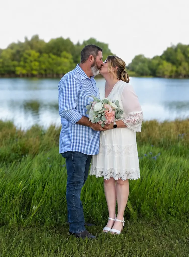 Jenni & Jay kissing after exchanging wedding vows